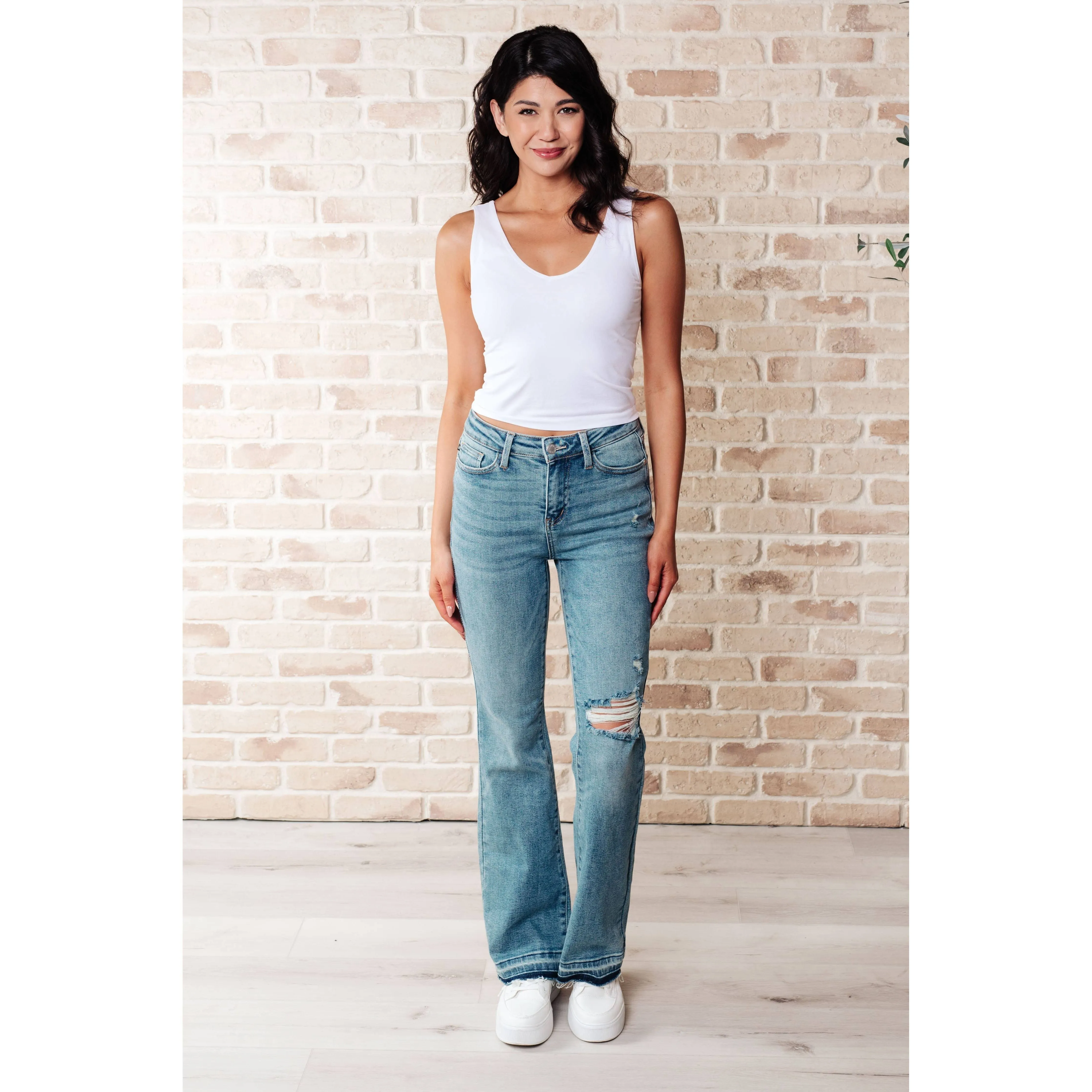 Judy Blue Mid Rise Distressed Released Hem Bootcut Jeans: 3/26